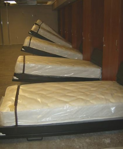 Wall beds can improve the quality of life for all firefighters by allowing each person to have their own bed, thus eliminating the need to change bedding with each tour